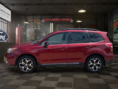 2015 Subaru Forester — rear three-quarter view