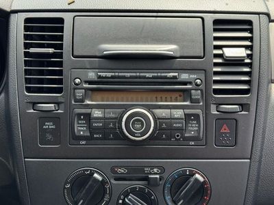 2012 Nissan Versa — rear three-quarter view