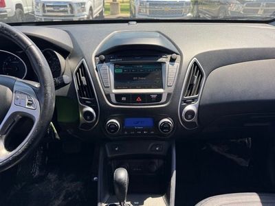 2012 Hyundai Tucson — side profile view