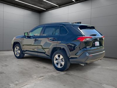 2025 Toyota RAV4 — rear three-quarter view
