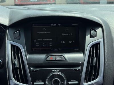 2014 Ford Focus — rear three-quarter view