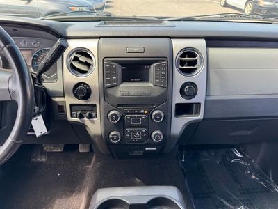 2014 Ford F-150 — side profile view