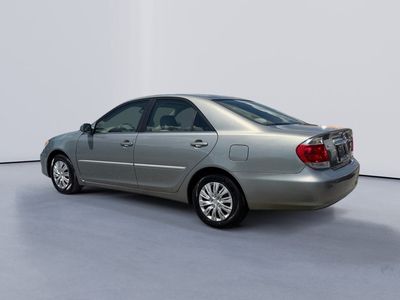 2006 Toyota Camry — rear three-quarter view