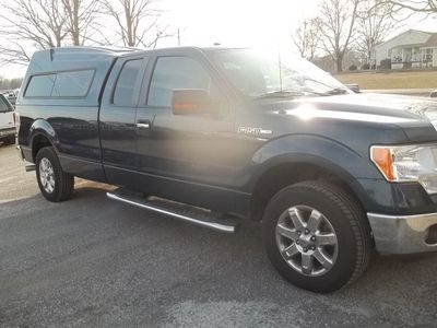2014 Ford F-150 — rear three-quarter view