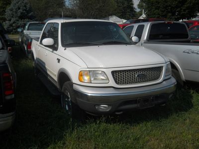 2001 Ford F-150 SuperCrew — rear three-quarter view