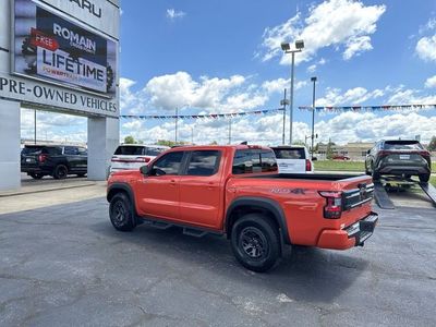 2025 Nissan Frontier — rear three-quarter view