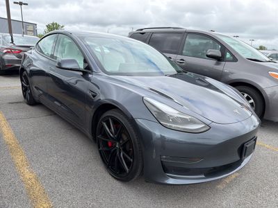 2023 Tesla Model 3 — side profile view