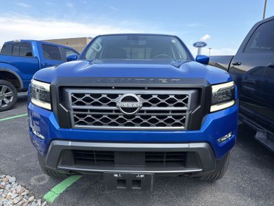2024 Nissan Frontier — rear three-quarter view