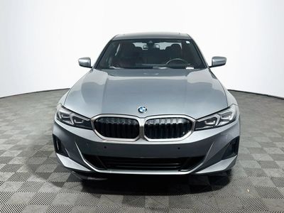 2024 BMW 330i — side profile view