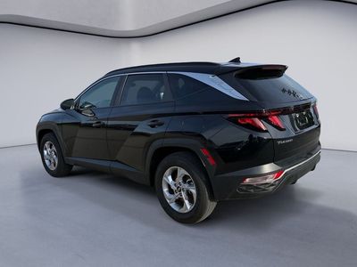 2024 Hyundai TUCSON — rear three-quarter view