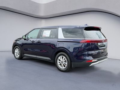2023 Kia Carnival — rear three-quarter view