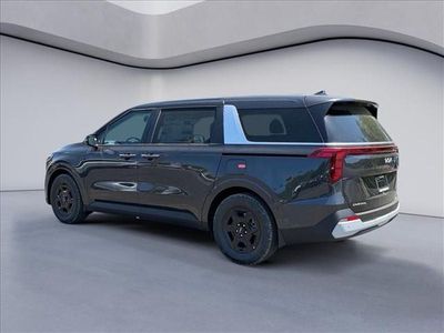 2026 Kia Carnival — rear three-quarter view