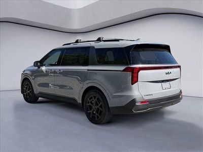 2026 Kia Carnival — rear three-quarter view
