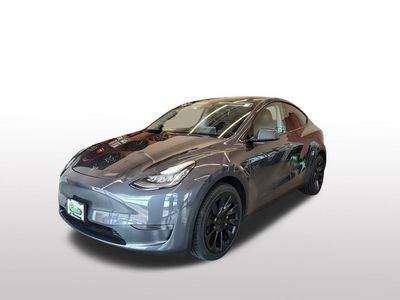 2023 Tesla Model Y — side profile view