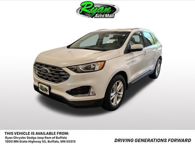 2019 Ford Edge SEL in White Platinum Clearcoat Metallic — front three-quarter view