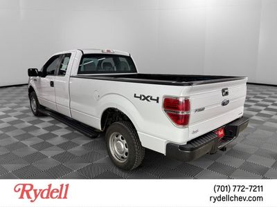 2014 Ford F-150 — rear three-quarter view