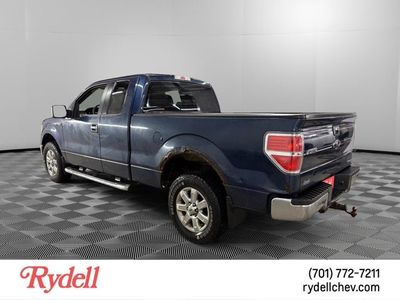 2013 Ford F-150 — rear three-quarter view