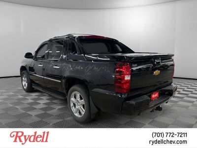 2013 Chevrolet Avalanche — rear three-quarter view