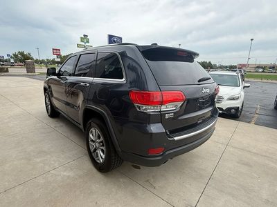 2014 Jeep Grand Cherokee — rear three-quarter view