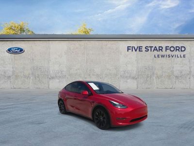 2023 Tesla Model Y — side profile view