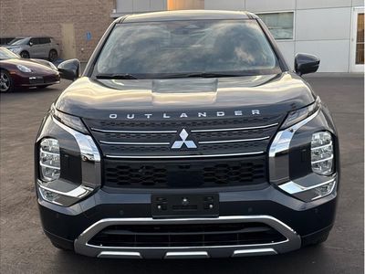 2025 Mitsubishi Outlander PHEV — rear three-quarter view