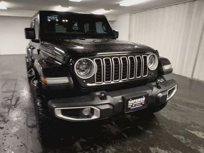 2024 Jeep Wrangler — rear three-quarter view