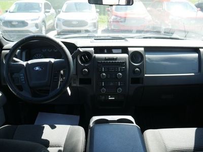 2014 Ford F-150 — rear three-quarter view