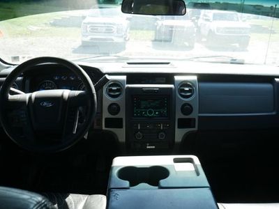 2013 Ford F-150 — rear three-quarter view
