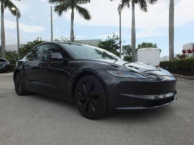 2025 Tesla Model 3 — side profile view