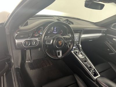 2018 Porsche 911 — rear three-quarter view