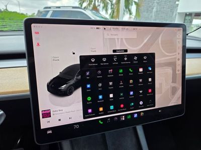 2023 Tesla Model Y — side profile view