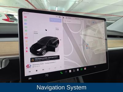 2023 Tesla Model Y — side profile view