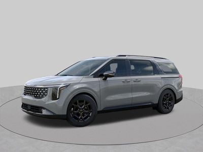 2026 Kia Carnival — rear three-quarter view