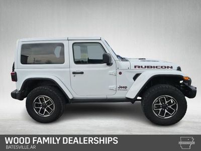 2024 Jeep Wrangler — rear three-quarter view