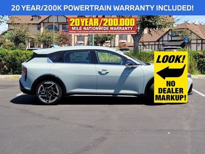 2026 Kia K4 Hatchback — rear three-quarter view