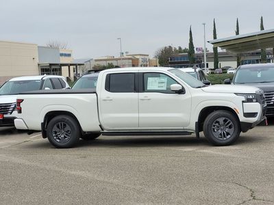 2026 Nissan Frontier — rear three-quarter view