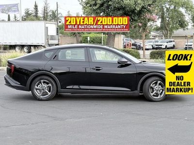 2026 Kia K4 — rear three-quarter view