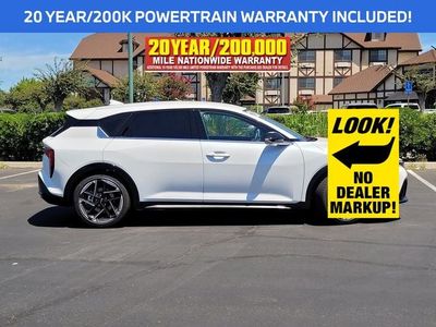 2026 Kia K4 Hatchback — rear three-quarter view