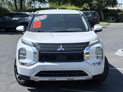 2024 Mitsubishi Outlander — rear three-quarter view