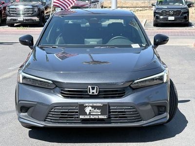 2024 Honda Civic — rear three-quarter view
