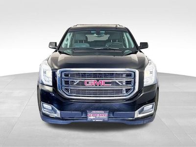2015 GMC Yukon — rear three-quarter view