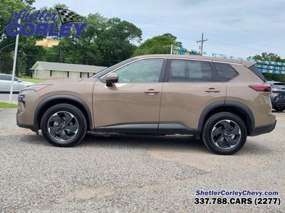 2025 Nissan Rogue — rear three-quarter view