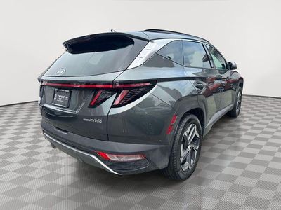 2024 Hyundai Tucson Hybrid — rear three-quarter view