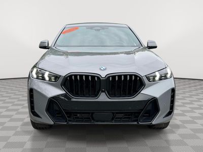 2026 BMW X6 — rear three-quarter view