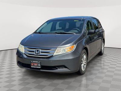 2013 Honda Odyssey — rear three-quarter view