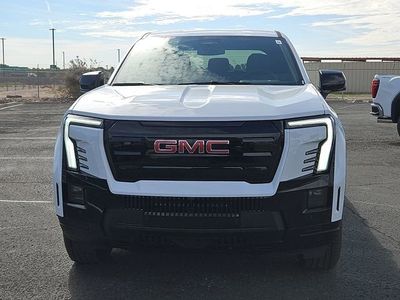 2026 GMC Sierra EV — rear three-quarter view