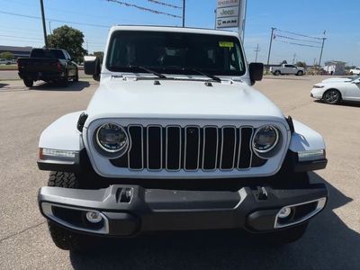 2025 Jeep Wrangler — rear three-quarter view