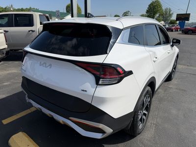 2024 Kia Sportage — rear three-quarter view