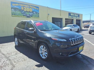 2014 Jeep Cherokee — rear three-quarter view