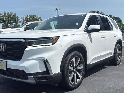 2023 Honda Pilot — rear three-quarter view
